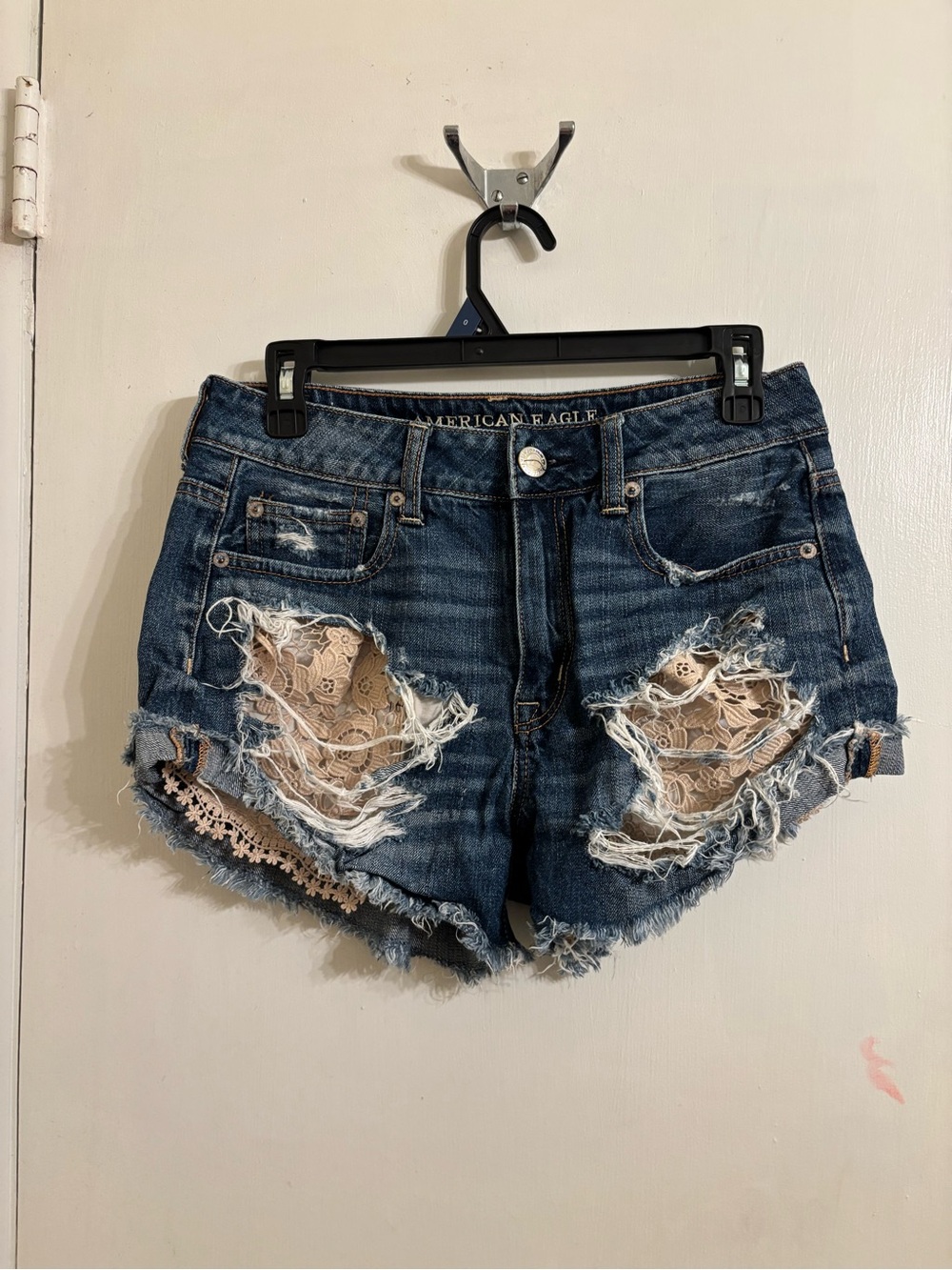American Eagle Outfitters Dark Blue Distressed Denim Shorts with Beige Lace